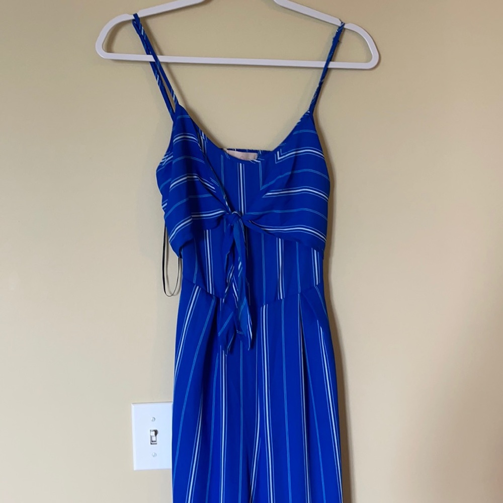 DONATED TOWARDS TORNADO RELIEF Blue and white striped jumpsuit